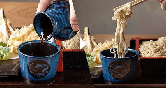 Dip the noodles into the sauce bowl before eating.  